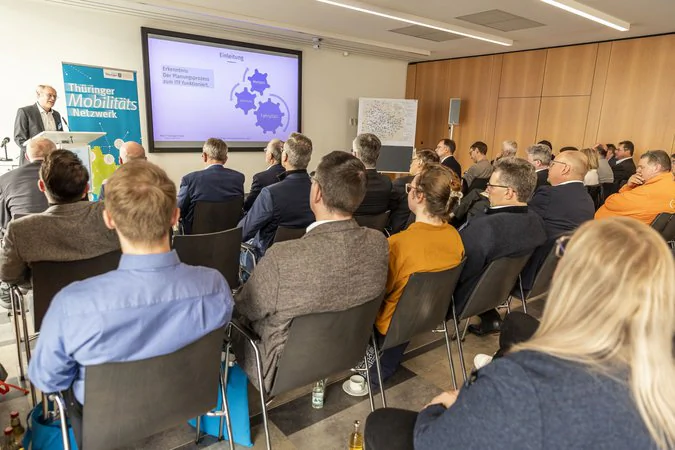 Das Publikum eines Vortrages von hinten